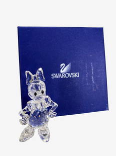 Disney Swarovski Daisy Duck Crystal Figurine: Disney Swarovski Daisy Duck Crystal Figurine. Box: 3 5/8 x 5 7/8 x 5 7/8 in.Local Pick up call one day before to make an appointment. TO SHIP THIS ITEM IN USA OR INTERNATIONAL, PLEASE CONTACT THE SHIP