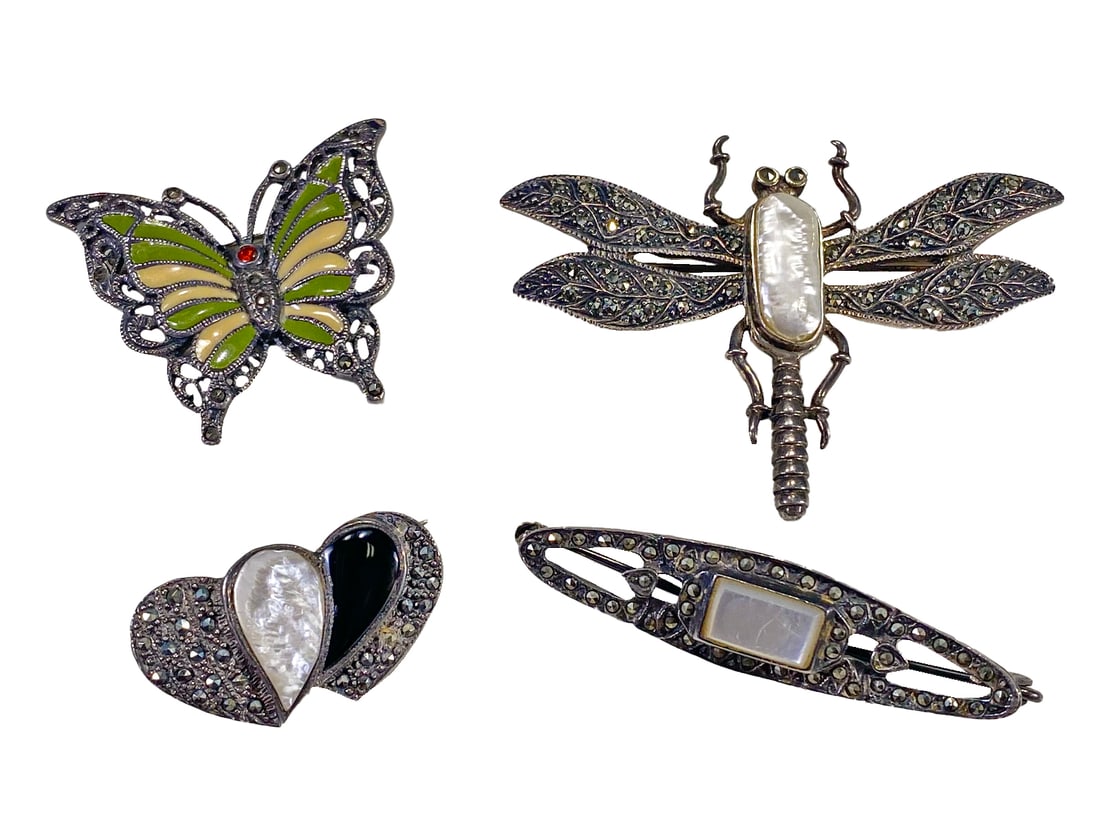Set of 4 Sterling 925 & Marcasite Brooches: Set of 4 Sterling 925 & Marcasite Brooches. Dragonfly: 1 3/4 x 2 1/2 in. Butterfly: 1 1/4 x 1 1/2 in. Hearts: 5 /8 x 1 1/4 in. Other: 2 1/8 x 1/2 in. Weight: 38.2 grams.Local Pick up call one day befo