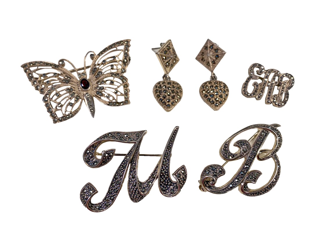 925 Sterling & Marcasite Brooches & Earings: 925 Sterling & Marcasite Brooches & Earings. Butterfly: 1 1/4 x 2 in. ERB: 5/8 x 7/8 in. Earings: 1 3/8 x 5 /8 in. MB: 1 1/8 x 1 5/8 in each. Weight: 41.7 grams.Local Pick up call one day before to ma