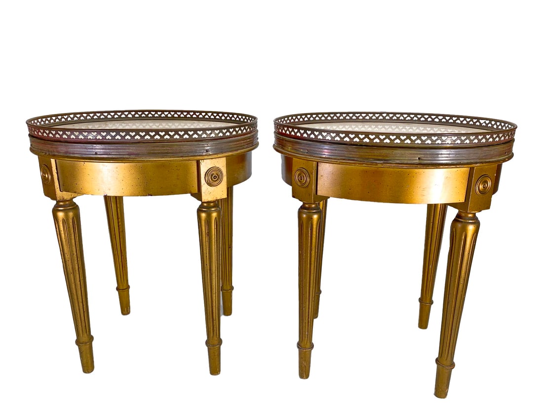Pair of French Louis XVI Style Gilt Tables: Pair of French Louis XVI Style Gilt Tables with a marble top and bronze frame. 18 1/4 x 15 1/2 x 12 3/4 in.Local Pick up call one day before to make an appointment. TO SHIP THIS ITEM IN USA OR INTERNA