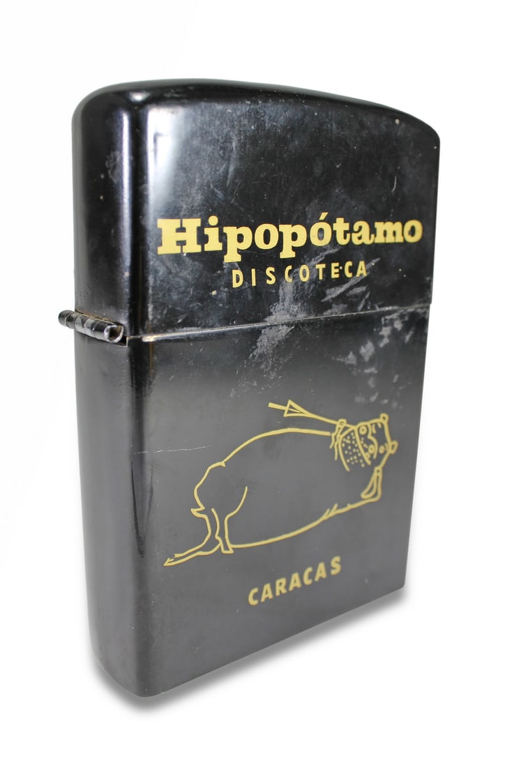 Hipopotamo Discoteca, (Discotheque) Caracas big lighter: Hipopotamo Discoteca, (Discotheque) Caracas big lighter. 6 1/2 x 4 1/2 x 1 1/2 in. Local Pick up call one day before to make an appointment. TO SHIP THIS ITEM IN USA OR INTERNATIONAL, PLEASE CONTACT T