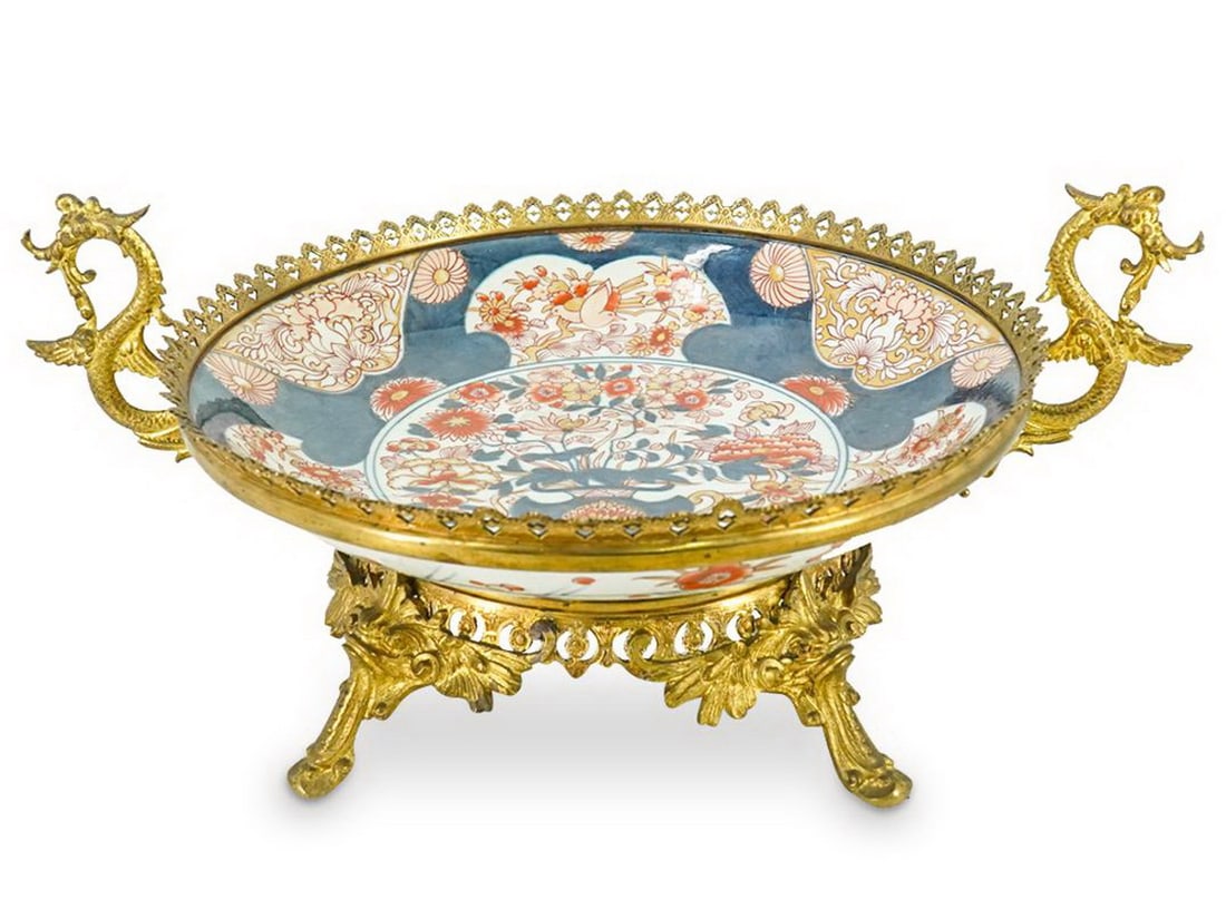 Antique Japanese Imari Porcelain & Bronze Centerpiece: Antique Japanese Imari Porcelain & Bronze Centerpiece. 6 1/2 x 14 5/8 x 10 7/8 in.Local Pick up call one day before to make an appointment. TO SHIP THIS ITEM IN USA OR INTERNATIONAL, PLEASE CONTACT TH