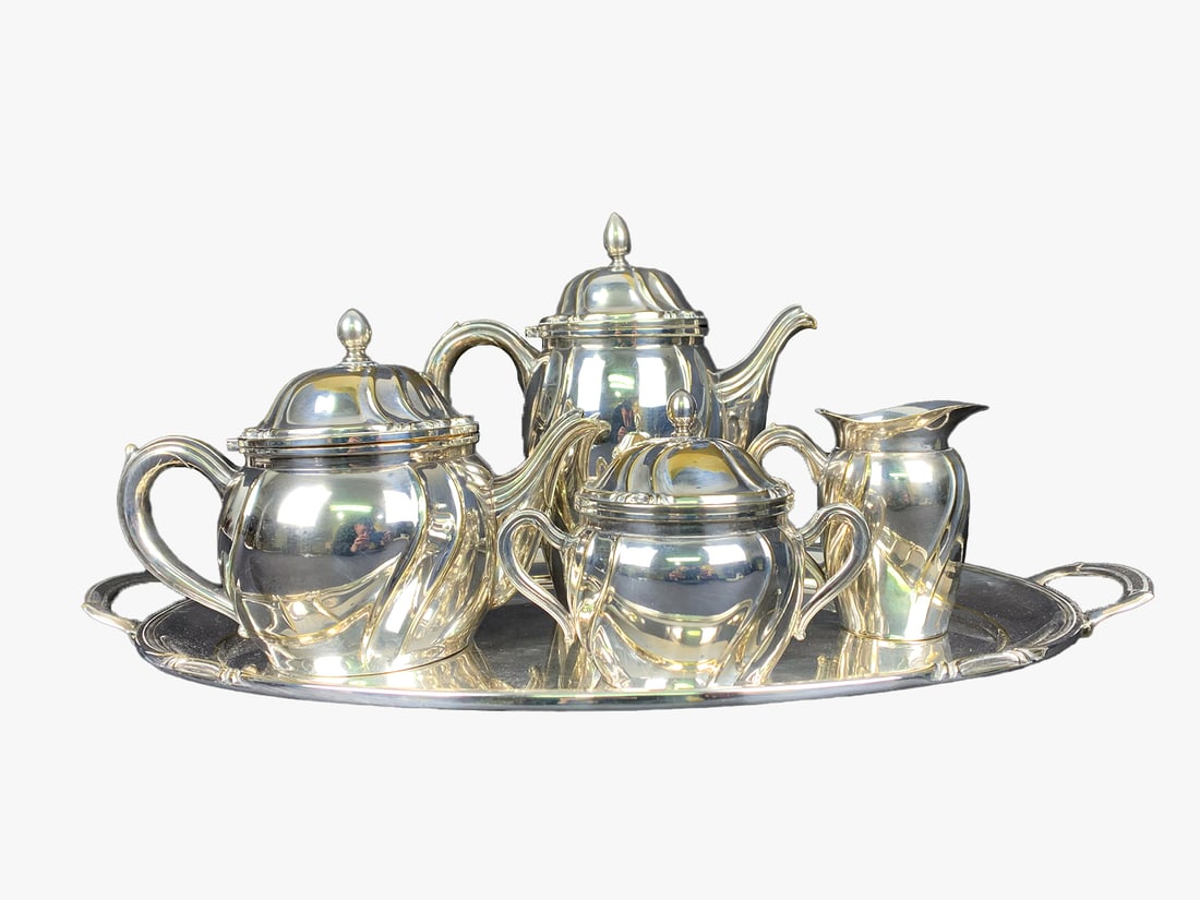 Vintage Lappas Silverplate tea-coffeepot set: Vintage Lappas Silverplate tea-coffeepot set. Coffeepot: 6 3/4 x 9 x 5 1/2 in. Teapot: 8 1/2 x 8 1/2 x 5 in. Sugarpot: 4 3/4 x 6 x 4 in. Creamer: 5 x 4 3/4 x 4 in. Tray: 1 1/4 x 19 1/2 x 9 3/4 in. Loc