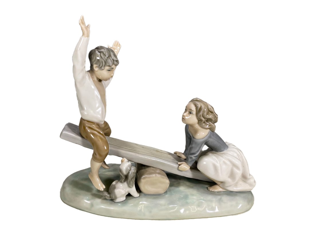 Lladro Playing Seesaw Porcelain Figurine: Lladro Playing Seesaw Porcelain Figurine. 8 x 9 1/8 x 4 3/8 in.Local Pick up call one day before to make an appointment. TO SHIP THIS ITEM IN USA OR INTERNATIONAL, PLEASE CONTACT THE SHIPPERS : 1) UPS