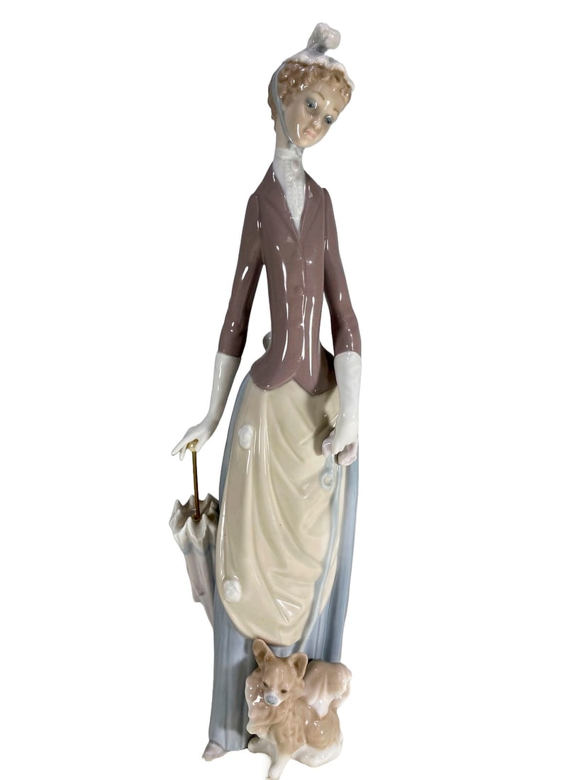 Lladro, Woman with Dog Porcelain Figurine: Lladro, Woman with Dog Porcelain Figurine. 13 7/8 x 3 3/4 in.Local Pick up call one day before to make an appointment. TO SHIP THIS ITEM IN USA OR INTERNATIONAL, PLEASE CONTACT THE SHIPPERS : 1) UPS s