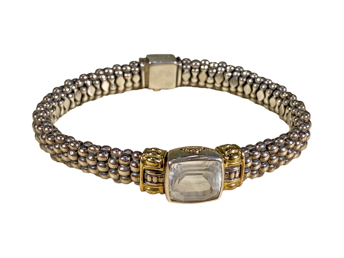 Lagos, Caviar 750 gold & 925 Silver Topaz Bracelet: Lagos, Caviar 750 gold & 925 Silver Topaz Bracelet. Weight: 50.2 grams.Local Pick up call one day before to make an appointment. TO SHIP THIS ITEM IN USA OR INTERNATIONAL, PLEASE CONTACT THE SHIPPERS 