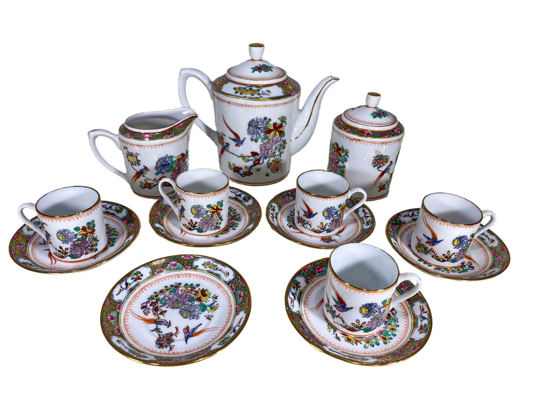 Vintage Oriental Coffeepot Porcelain Set: Vintage Oriental Coffeepot Porcelain Set. Coffeepot: 6 x 7 x 4 in. Sugarpot; 4 1/2 x 2 7/8 in. Creamer: 3 1/4 x 4 5/8 x 2 7/8 in. Cup: 1 7/8 x 2 5/8 x 2 in. Sauce: 4 1/4 in diameter.Local Pick up call
