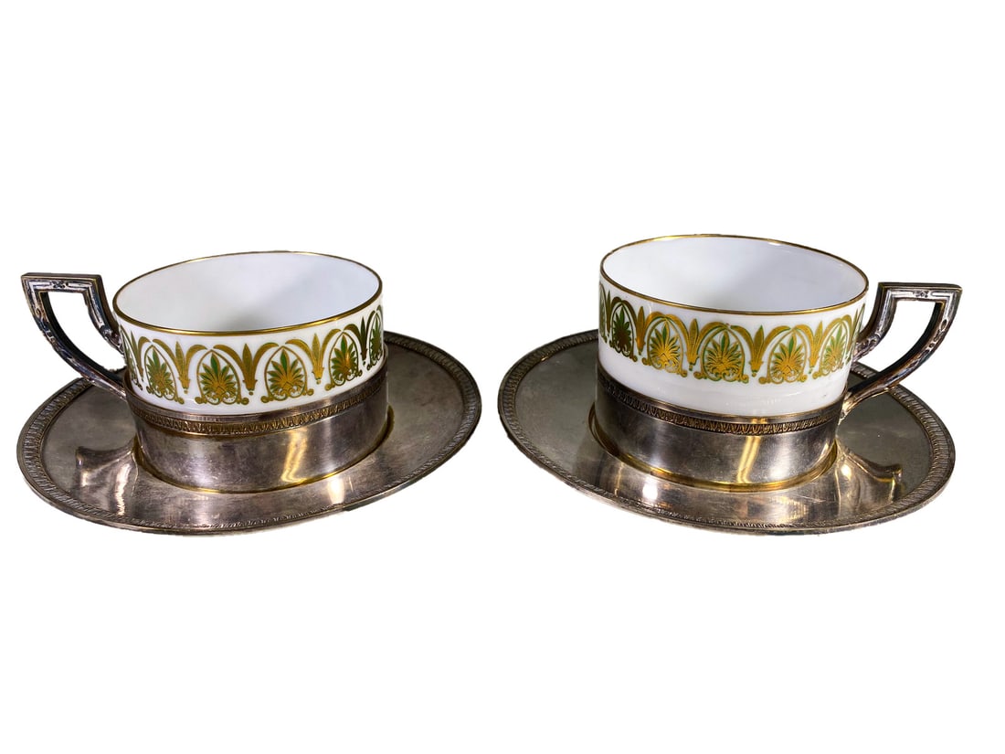 Victor Saglier, France 1890 Silverplate & Porcelain Teacups: Victor Saglier, France 1890 Silverplate & Porcelain Teacups. Cup: 2 1/8 x 4 1/4 x 3 1/8 in. Sauce: 5 5/8 in.Local Pick up call one day before to make an appointment. TO SHIP THIS ITEM IN USA OR INTERN