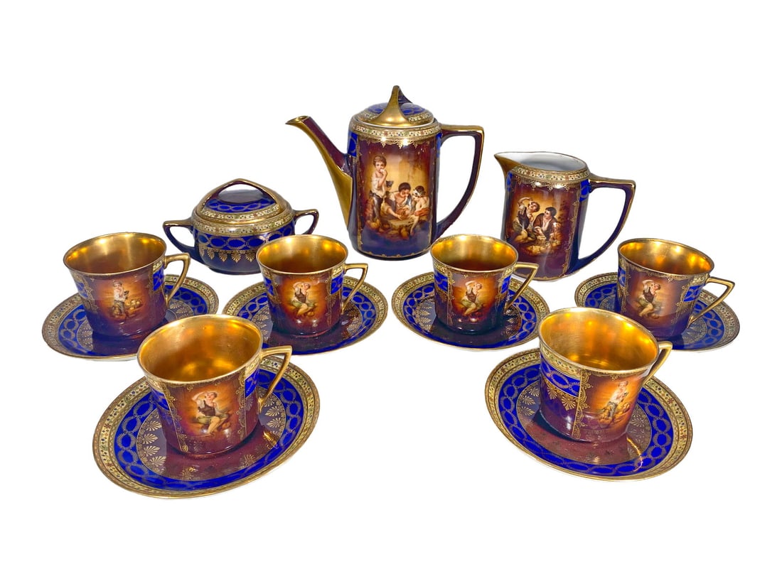 Czechoslovakian Set Of 15 Porcelain Pcs: Czechoslovakian Set Of 15 Porcelain Pcs. Teapot: 7 3/8 x 8 1/4 x 3 7/8 in. Creamer: 4 3/4 x 5 5/8 x 3 1/8 in. Sugarpot: 3 3/4 x 6 1/8 x 4 in. Cup: 2 3/4 x 3 5/8 x 3 in and Plate: 5 3/4 in diameter.Loc