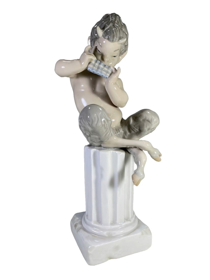 Lladro Satyr Playing Flute Porcelain Figurine: Lladro Satyr Playing Flute Porcelain Figurine. 10 3/4 x 4 1/4 x 4 in.Good condition. Local Pick up call one day before to make an appointment. TO SHIP THIS ITEM IN USA OR INTERNATIONAL, PLEASE CONTACT
