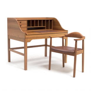 Andreas Hansen: A free-standing solid cherry wood: A free-standing solid cherry wood writing desk, front with storage space and three drawers, table top has two small flaps and one larger, middle flap covered with brown leather and an armchair, seat w