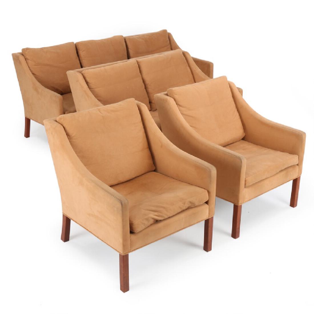 Børge Mogensen: Living room suite with teak legs: Living room suite with teak legs consisting of freestanding three and two seater sofa and a pair of matching easy chairs. Sides, back and loose cushions upholstered with light brown alcantara. Model 2