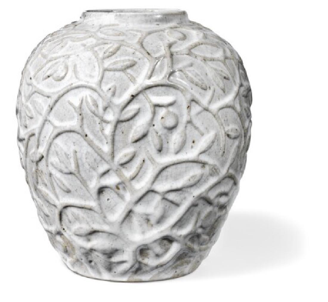 Axel Salto: Stoneware vase modelled with branches,: Stoneware vase modelled with branches, fruits and leaves. Decorated with greyish white glaze. Signed Salto. Made at Carl Halier's studio, Københavns Stentøjsbrænderi. Designed 1930. H. 29,5 cm. Lit