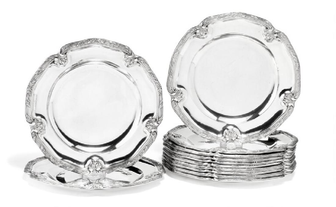 A set of 12 French sterling silver dessert plates.