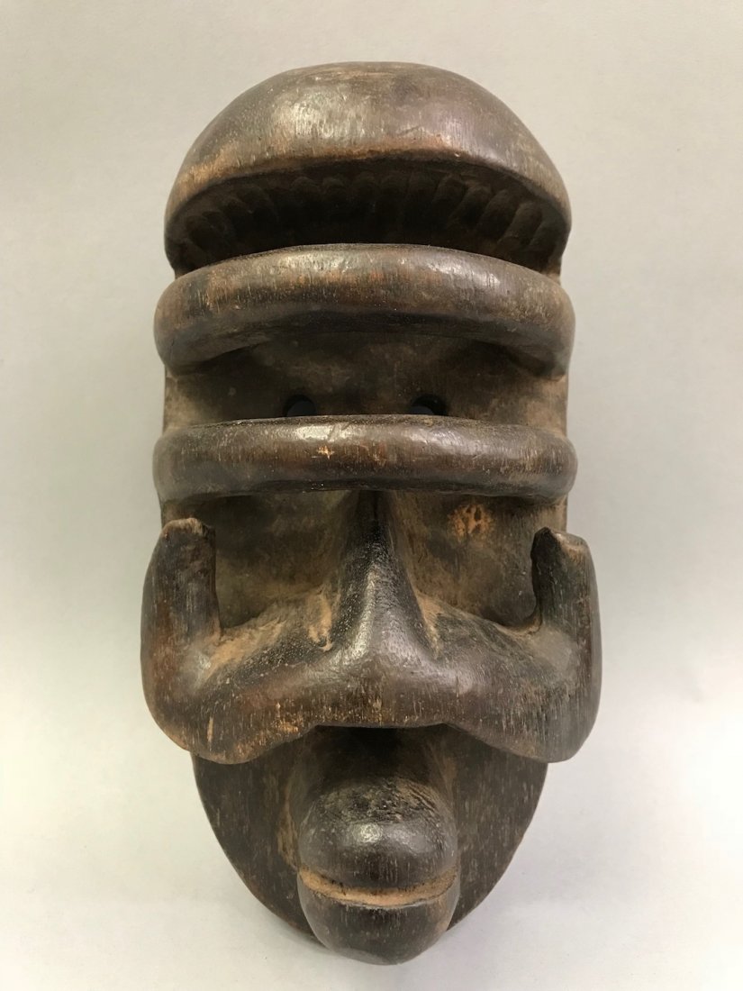 Bete Mask: African Art Bete Mask is from Ivory Coast. The dimension is 8.5 inches high x 4.5 inches wide. The shipping cost for domestic is $45.00 flat rate shipping within the Continental US, the International