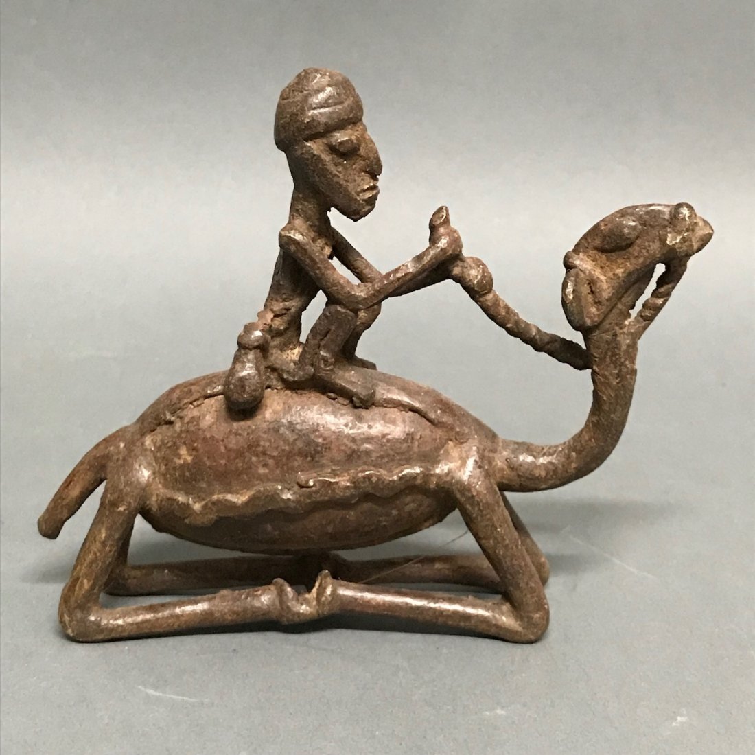 Chad Camel Rider: African Art Chad Camel Rider is from Chad. The dimension is 4.5 inches high x 5 inches wide. The shipping cost for domestic is $45.00 flat rate shipping within the Continental US, the International fo