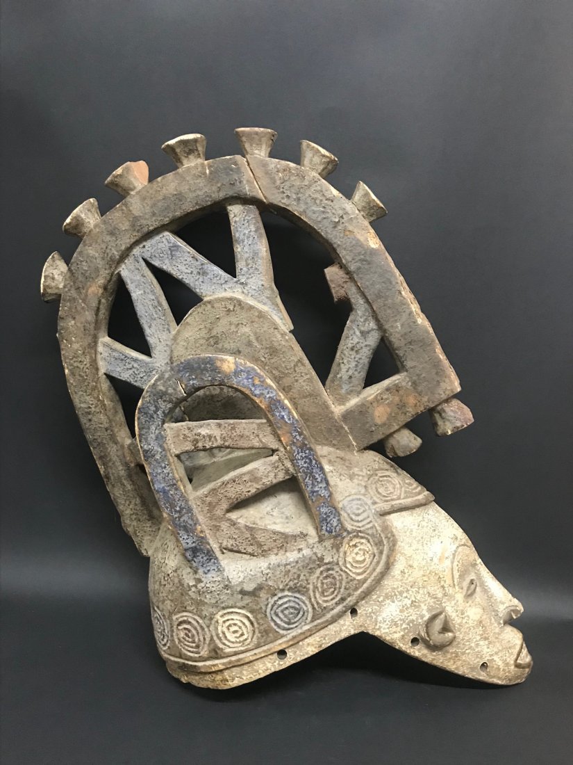 Ibo Mask: African Art Ibo Mask from Nigeria. The dimension is 23 inches high x 13.5 inches wide. The packing and shipping cost with insurance for domestic is $45.00 flat rate shipping within the Continental US,