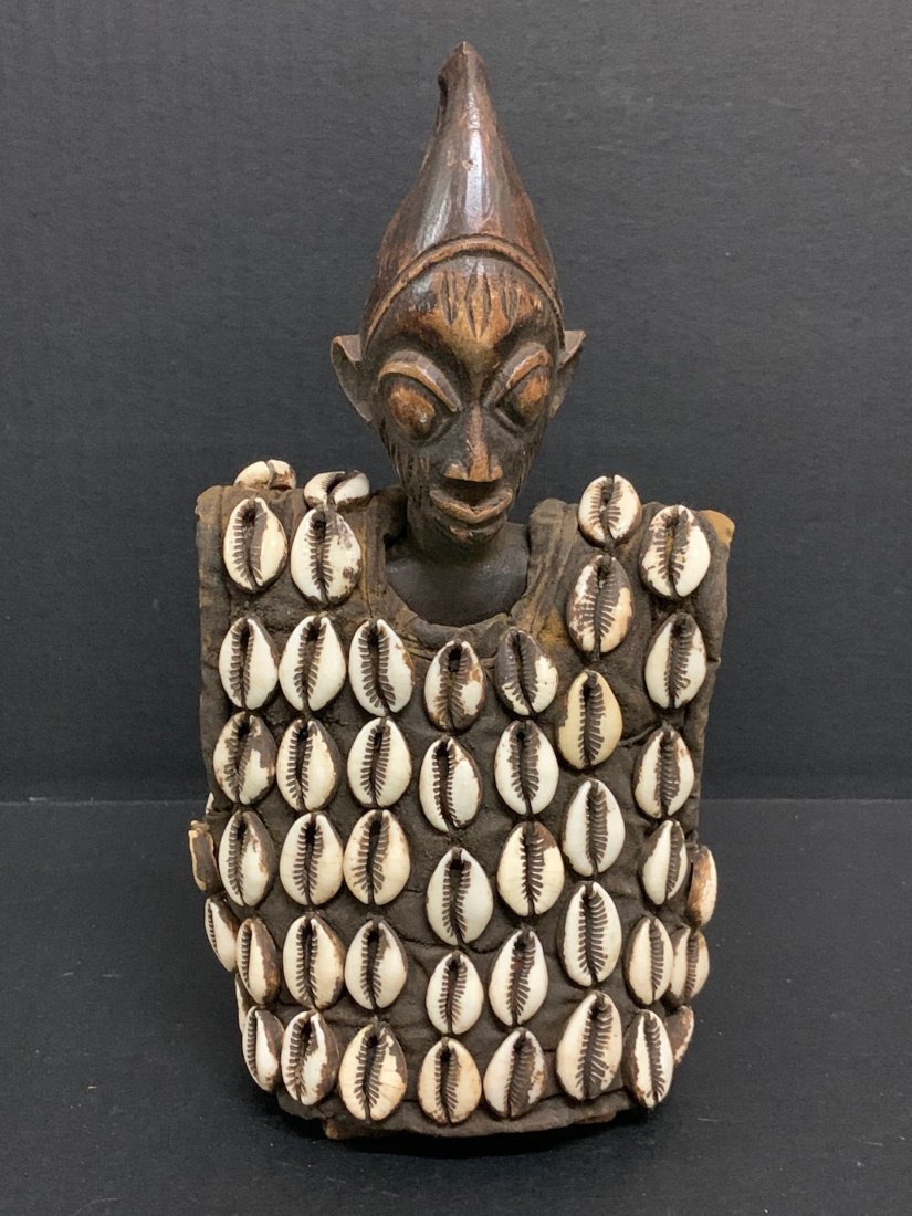 Ibeji Doll: African Tribal Art Ibeji Doll from Nigeria. The dimension 10.25 inches high x 5.5 inches wide. The packing and shipping cost with insurance for domestic is $30.00 flat rate shipping within the Contine