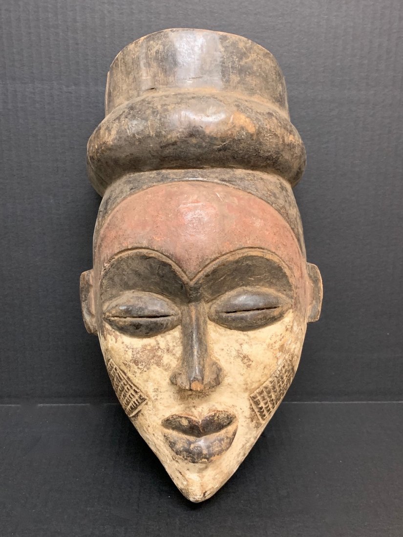 Ibo Mask: African Art Ibo Mask is from Nigeria. The dimension is 14 inches high x 8 inches wide. The shipping cost for domestic is $40.00 flat rate shipping within the Continental US, the International foreign 