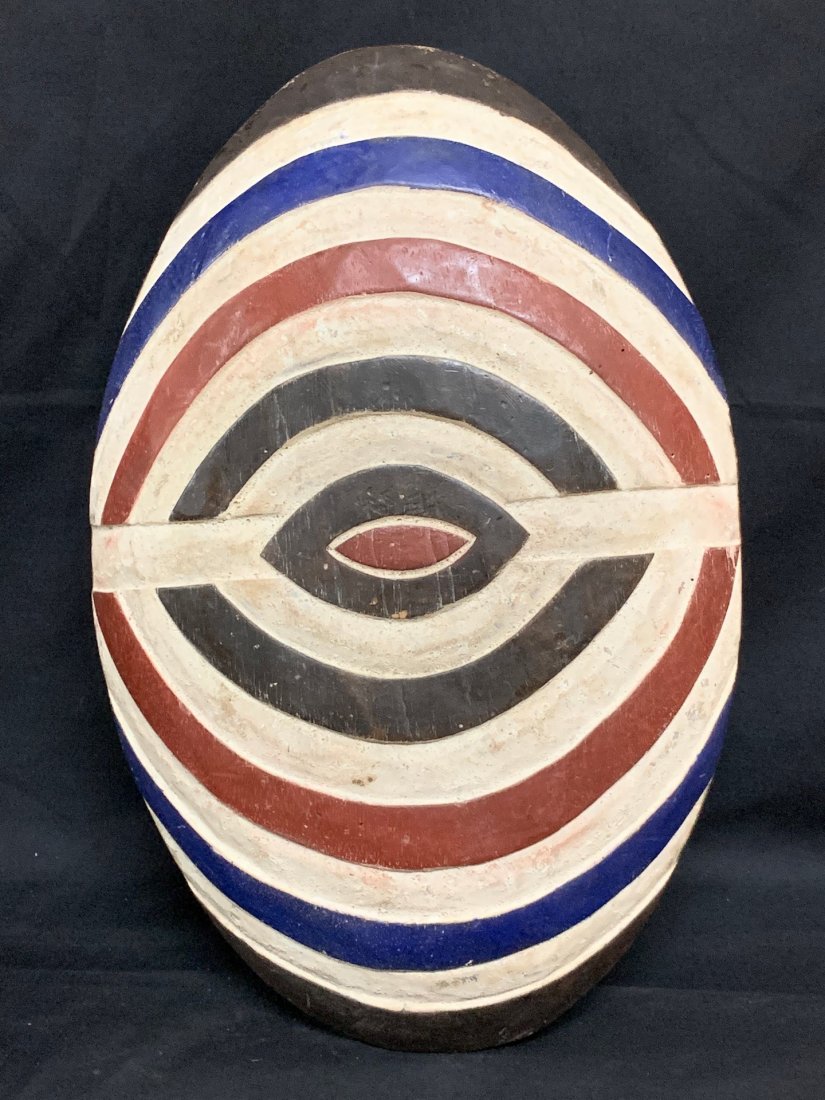 Zulu Shield: African Art Zulu Shield is from South Africa. The dimension is 16 inches high x 3 inches wide. The shipping cost for domestic is $50.00 flat rate shipping within the Continental US, the International 