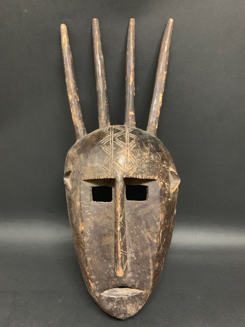 Bamana Mask: African Art Bamana Mask is from Mali. The dimension is 17 inches high x7 inches wide. The shipping cost for domestic is $45.00 flat rate shipping within the Continental US, the International foreign s