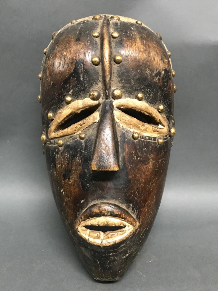 Bete Mask: African Art Bete Mask is fromIvory Coast . The dimension is 13 inches high x 7.5 inches wide. The shipping cost for domestic is $45.00 flat rate shipping within the Continental US, the International f