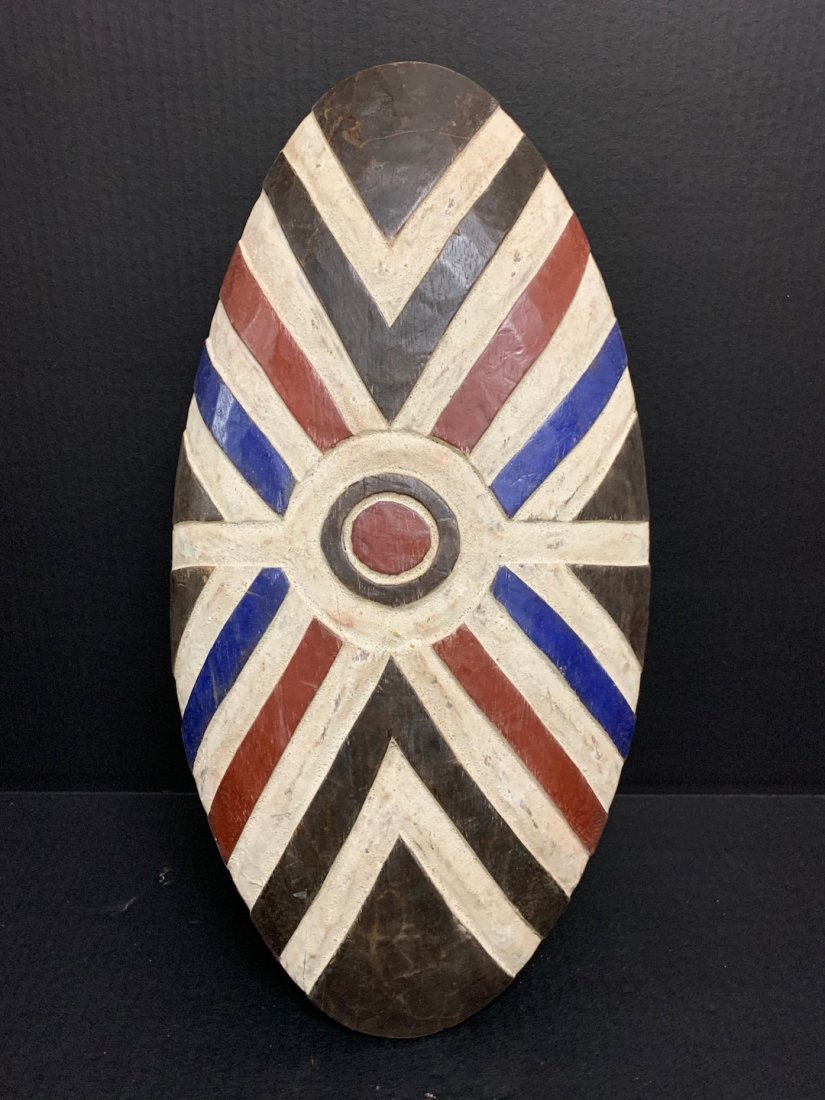 Zulu Shield: African Art Zulu Shield is from South Africa. The dimension is 20 inches high x 10 inches wide. The shipping cost for domestic is $45.00 flat rate shipping within the Continental US, the International
