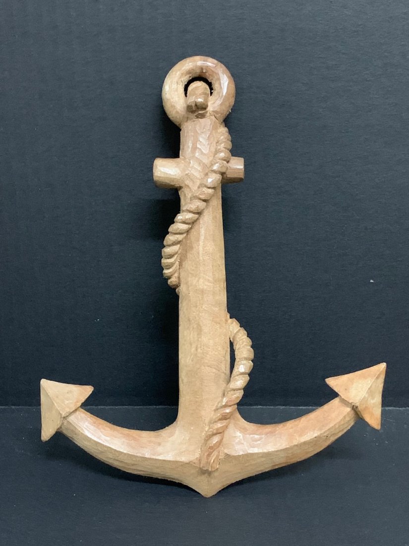 Sailor Anchor: Carved Wood Decorative Work of Art, Sailor Anchor Form Pattern/ Sculpture, dimension is 10 inches high x 8 inches wide. The shipping cost for domestic is $25.00 flat rate shipping within the Continent