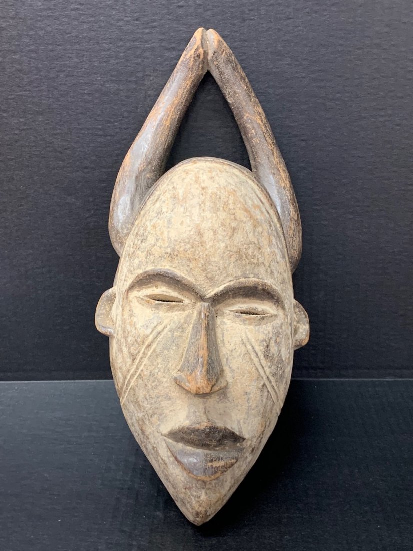 Ibo Mask: African Art Ibo Mask is from Nigeria. The dimension is 16.5 inches high x 7 inches wide. The shipping cost for domestic is $40.00 flat rate shipping within the Continental US, the International foreig