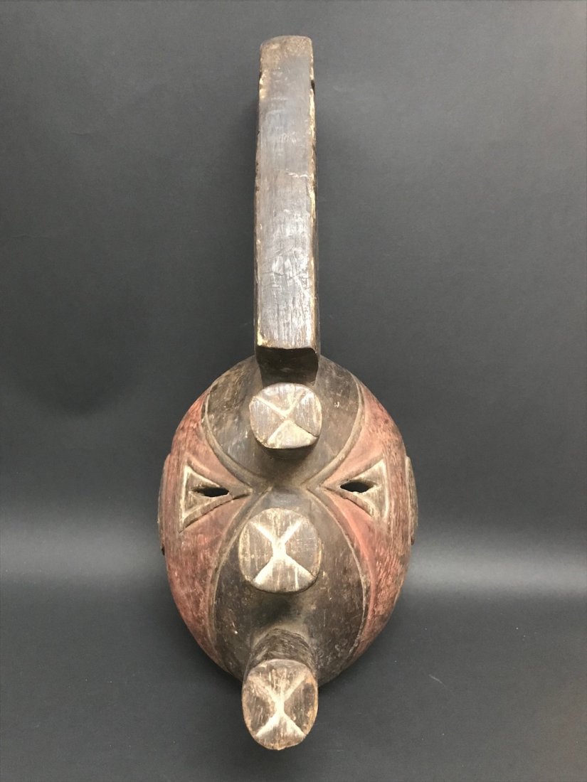 Ibo Mask: African Art Ibo Mask is from Nigeria. The dimension is 18.5 inches high x 8.5 inches wide. The shipping cost for domestic is $45.00 flat rate shipping within the Continental US, the International fore