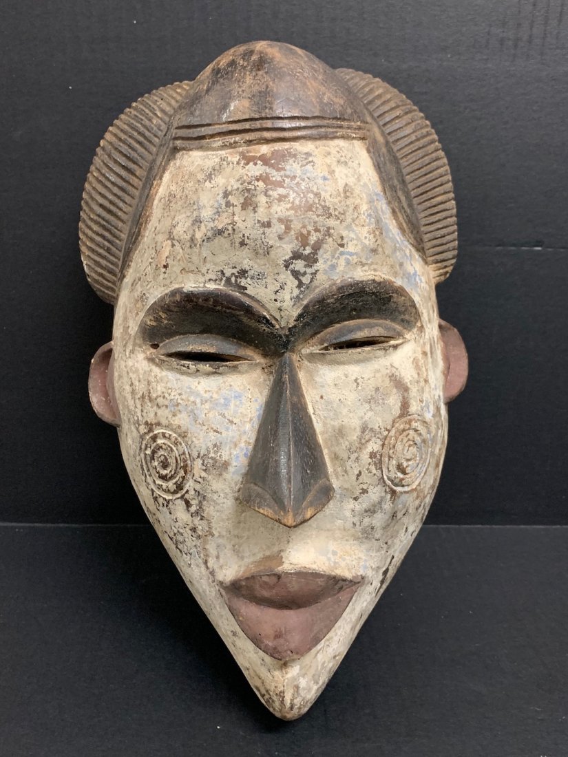 Ibo Mask: African Art Ibo Mask is from Nigeria . The dimension is 13 inches high x 8 inches wide. The shipping cost for domestic is $45.00 flat rate shipping within the Continental US, the International foreign