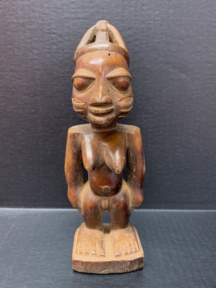 Yoruba Statue: African Art Yoruba Statue is from Nigeria. The dimension is 9.75 inches high x 3.5 inches wide. The shipping cost for domestic is $30.00 flat rate shipping within the Continental US, the International