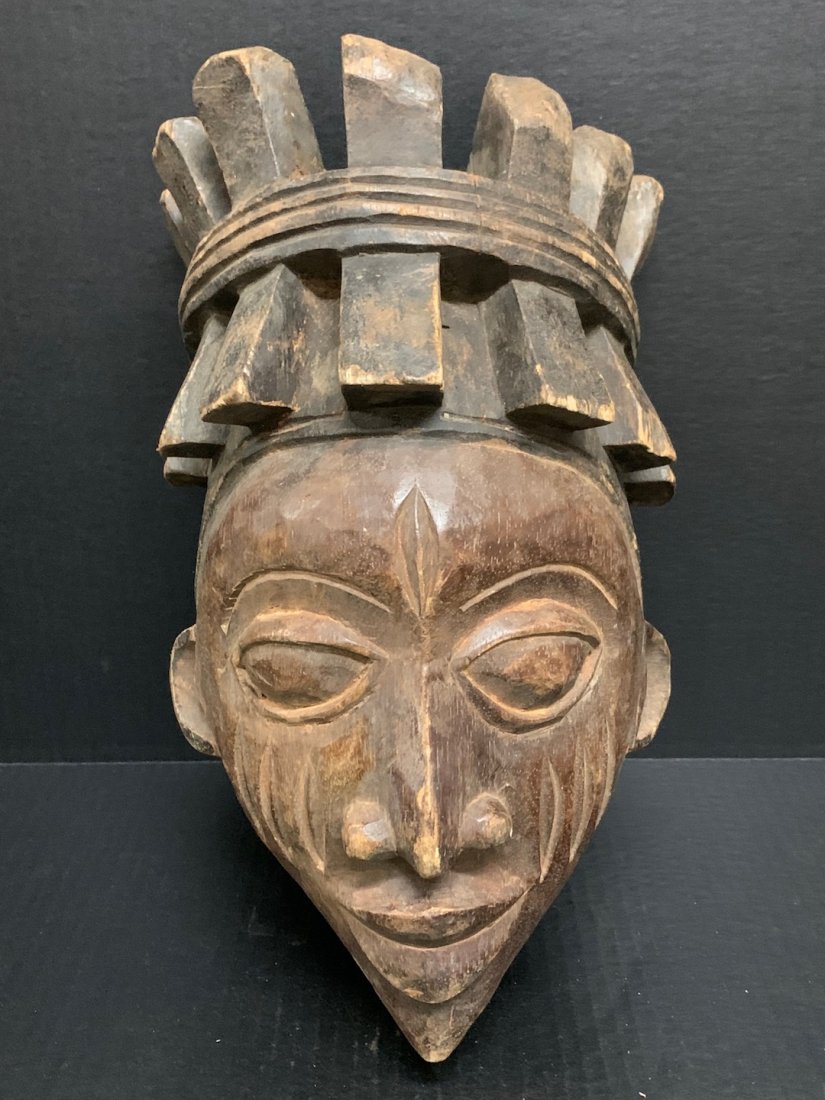 Yoruba Mask: African Art Yoruba Mask from Nigeria. The dimension is 14 inches high x 8.5 inches wide. The shipping cost for domestic is $45.00 flat rate shipping within the Continental US, the International foreig
