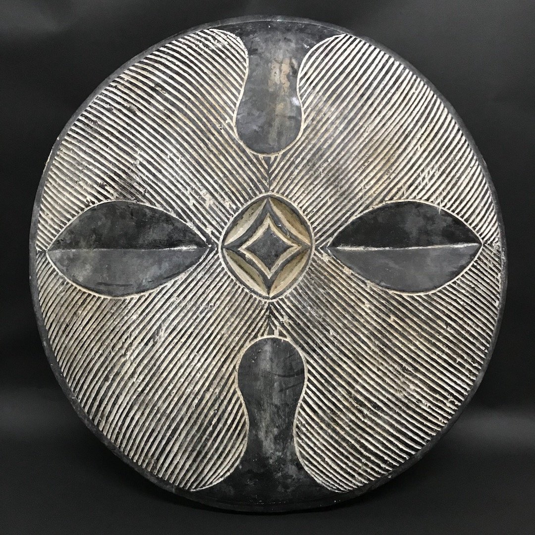 Round Zulu Shield: African Art Round Zulu Shield is from South Africa. The dimension is 20 inches high x 20 inches wide. The shipping cost for domestic is $50.00 flat rate shipping within the Continental US, the Interna