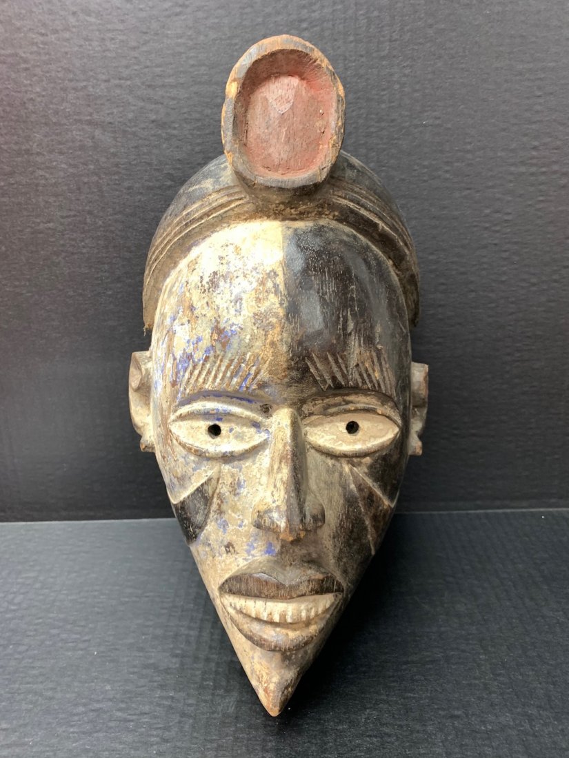Ibo Mask: African Art Ibo Mask is from Nigeria. The dimension is 13.5 inches high x 8 inches wide. The shipping cost for domestic is $45.00 flat rate shipping within the Continental US, the International foreig