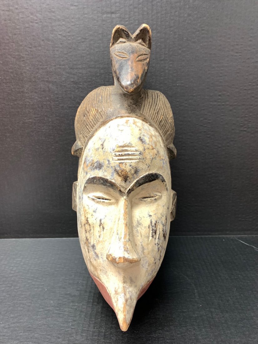 Ibo Mask: African Art Ibo Mask is from Nigeria. The dimension is 15 inches high x 7 inches wide. The shipping cost for domestic is $45.00 flat rate shipping within the Continental US, the International foreign 