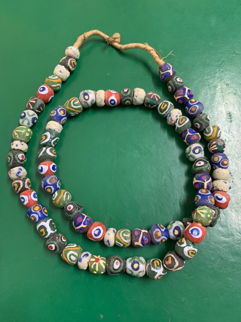 Bone Beads Necklace: African Art Bone Beads Necklace. The dimension is 28 inches round. The shipping cost for domestic is 15.00 flat rate shipping within the Continental US, the International foreign shipping rates are de