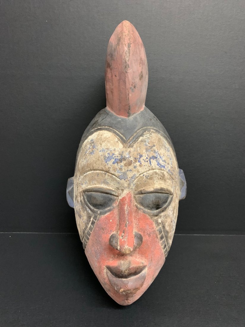 Ibo Mask: African Art Ibo Mask is from Nigeria. The dimension is 15 inches high x 7.5 inches wide. The shipping cost for domestic is $45.00 flat rate shipping within the Continental US, the International foreig