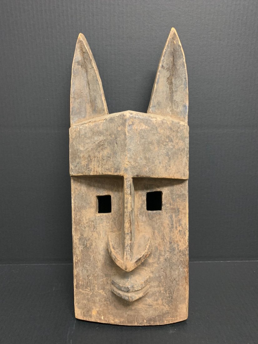 Dogon Mask: African Art Dogon Mask is from Mali. The dimension is 20 inches high x 7.5 inches depth x 8 inches wide. The shipping cost for domestic is $45.00 flat rate shipping within the Continental US, the Inte