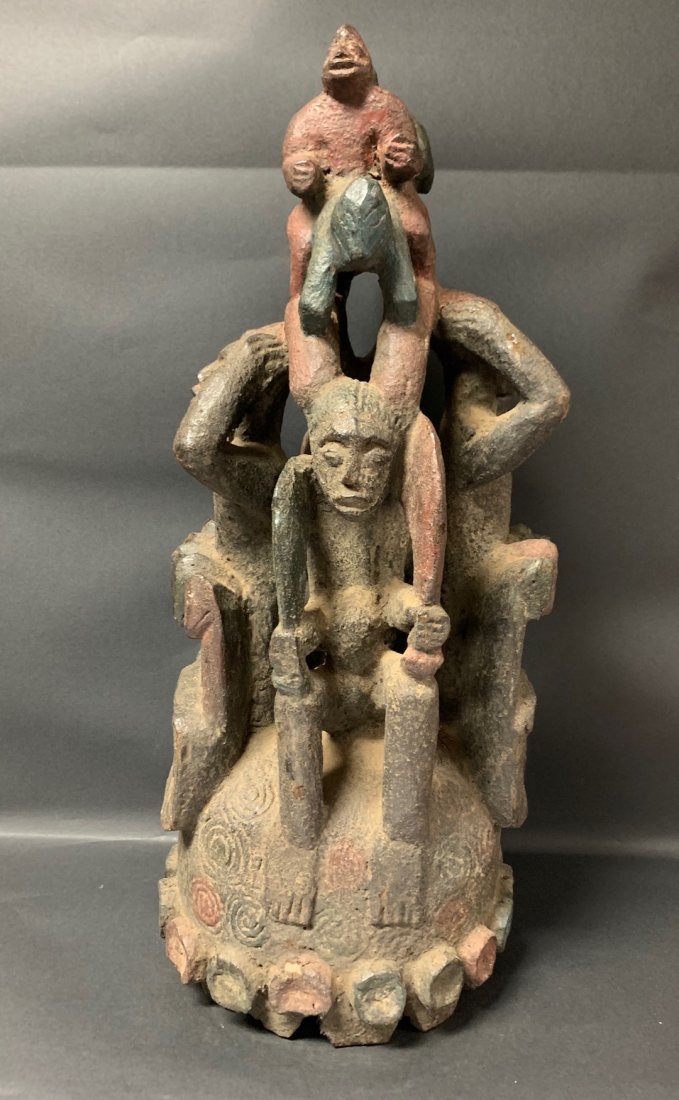 Yoruba Helmet Mask: African Art Yoruba Helmet Mask from Nigeria. The dimension is 26.5 inches high x 11.5 inches depth x 11 inches wide. The shipping cost for domestic is $75.00 flat rate shipping within the Continental 