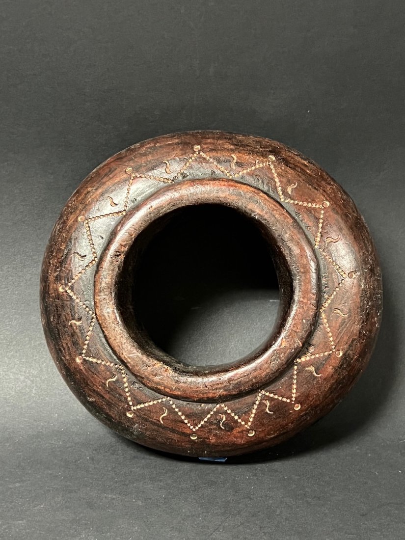 Nigerian Wood Currency Bracelet: African Art Nigerian Wood Currency Bracelet from Nigeria. The dimension is 7 inches high x 3 inches wide. The shipping cost for domestic is $35.00 flat rate shipping within the Continental US includin