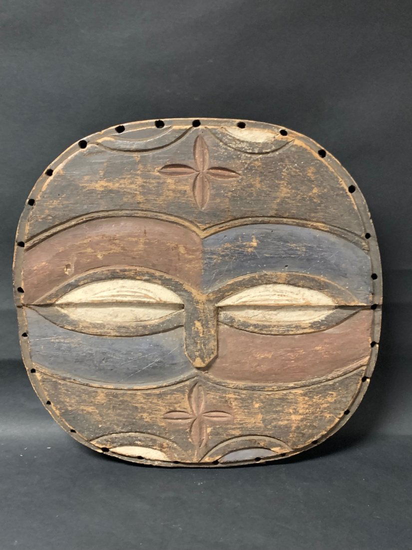 Eket Shield: African Art Eket Shield from Nigeria. The dimension is 12 inches high x 14.5 inches wide. The shipping cost for domestic is $45.00 flat rate shipping within the Continental US including handling, pack