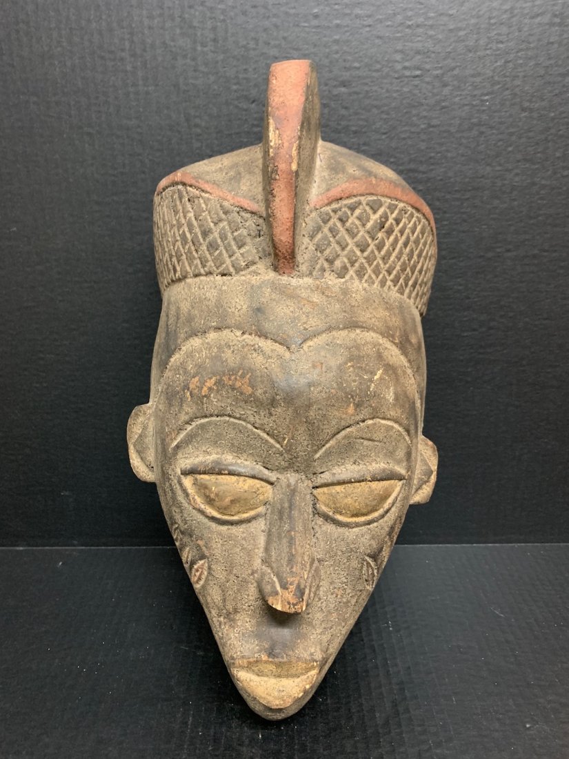 Yoruba Mask: African Art Yoruba Mask from Nigeria. The dimension is 17 inches high x 9 inches wide. The shipping cost for domestic is $45.00 flat rate shipping within the Continental US including handling, packing