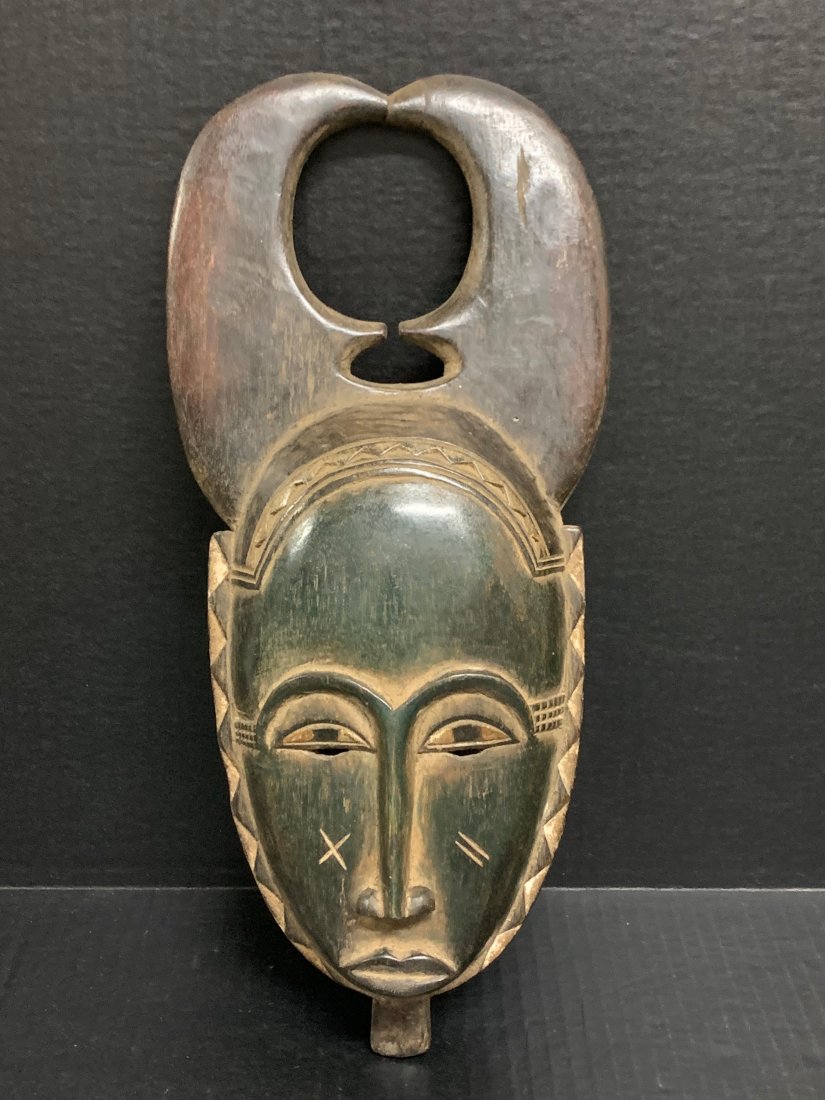 Yaure Mask: African Art Yaure Mask from Ivory Coast. The dimension is 14.5 inches high x 6.75 inches wide. The shipping cost for domestic is $45.00 flat rate shipping within the Continental US including handling,