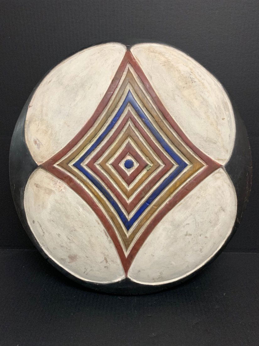 Zulu Shield: African Art Zulu Shield from South Africa. The dimension is 20 inches high x 20 inches wide. The shipping cost for domestic is $55.00 flat rate shipping within the Continental US including handling, p