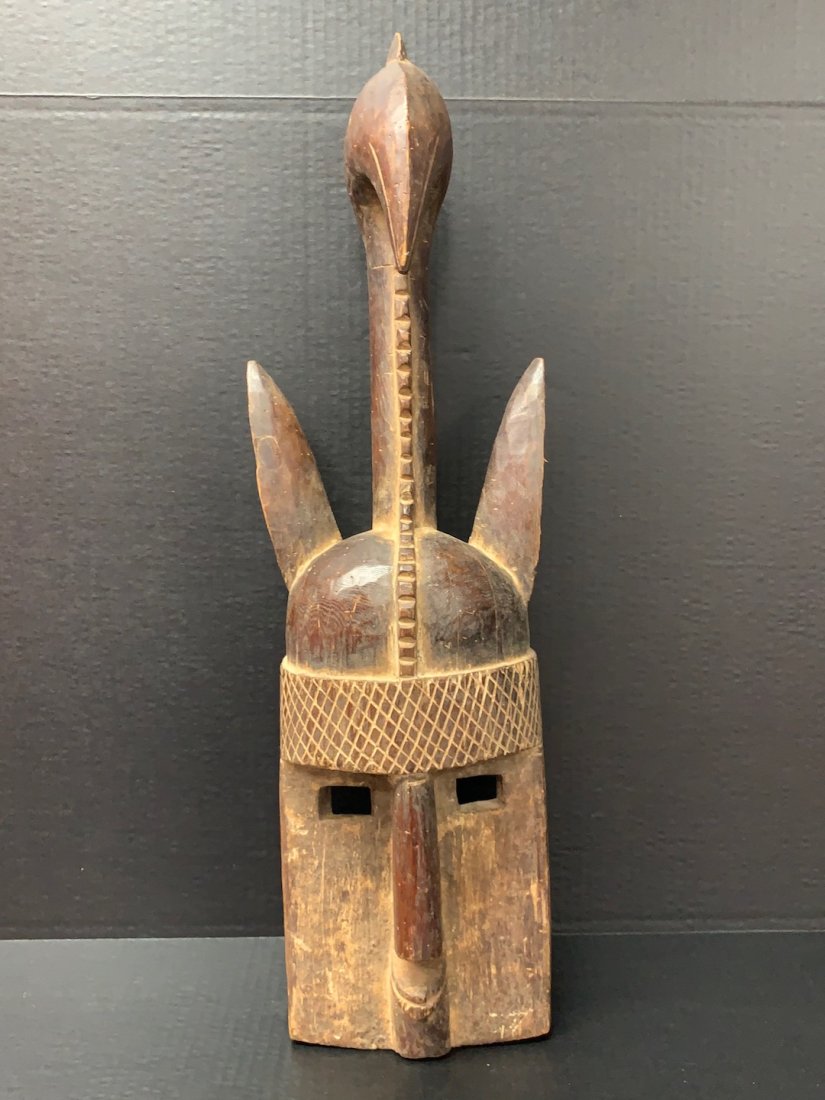 Dogon Mask: African Art Dogon Mask from Mali. The dimension is 25 inches high x 8 inches wide. The shipping cost for domestic is $55.00 flat rate shipping within the Continental US including handling, packing and