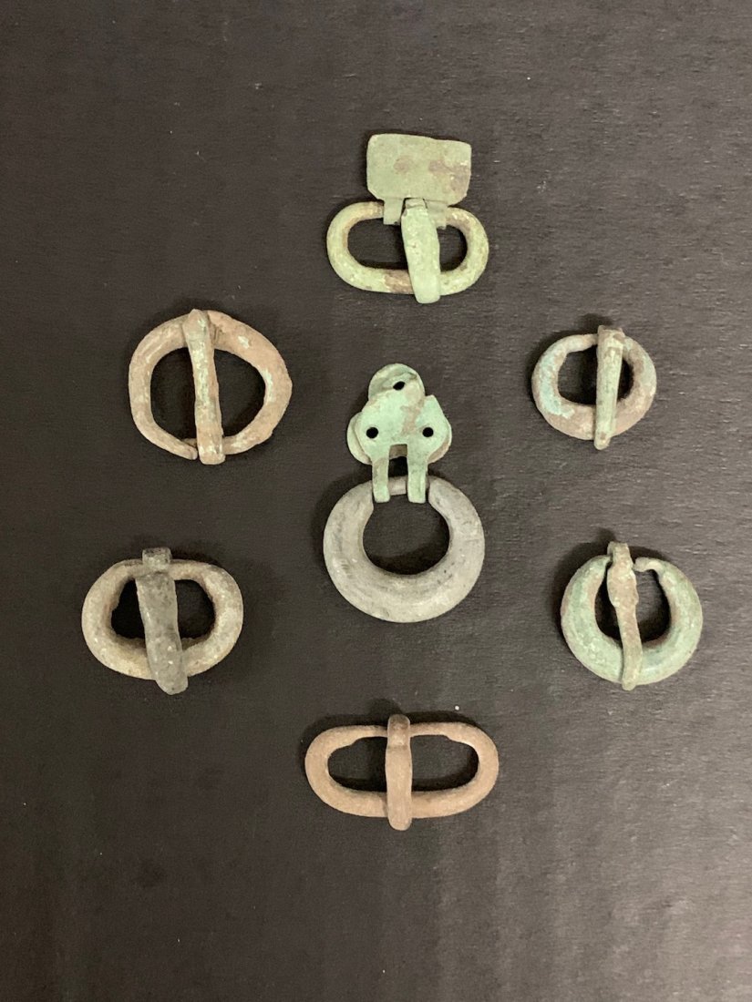 Set of 7 Roman Style Bronze Belt Buckles: Set of 7 Roman Style Bronze Belt Buckles. The dimension is 1 inches high x 1 inches wide. The shipping cost for domestic is $20.00 flat rate shipping within the Continental US including handling, pack