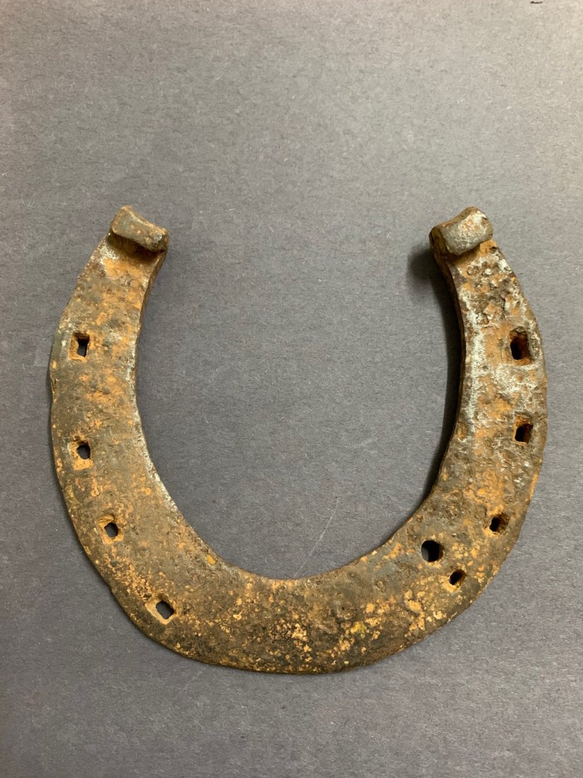 Bronze Horse Shoe: Bronze Horse Shoe. The dimension is 5.5 inches high x 6 inches wide. The shipping cost for domestic is $20.00 flat rate shipping within the Continental US including handling, packing and insurance (in