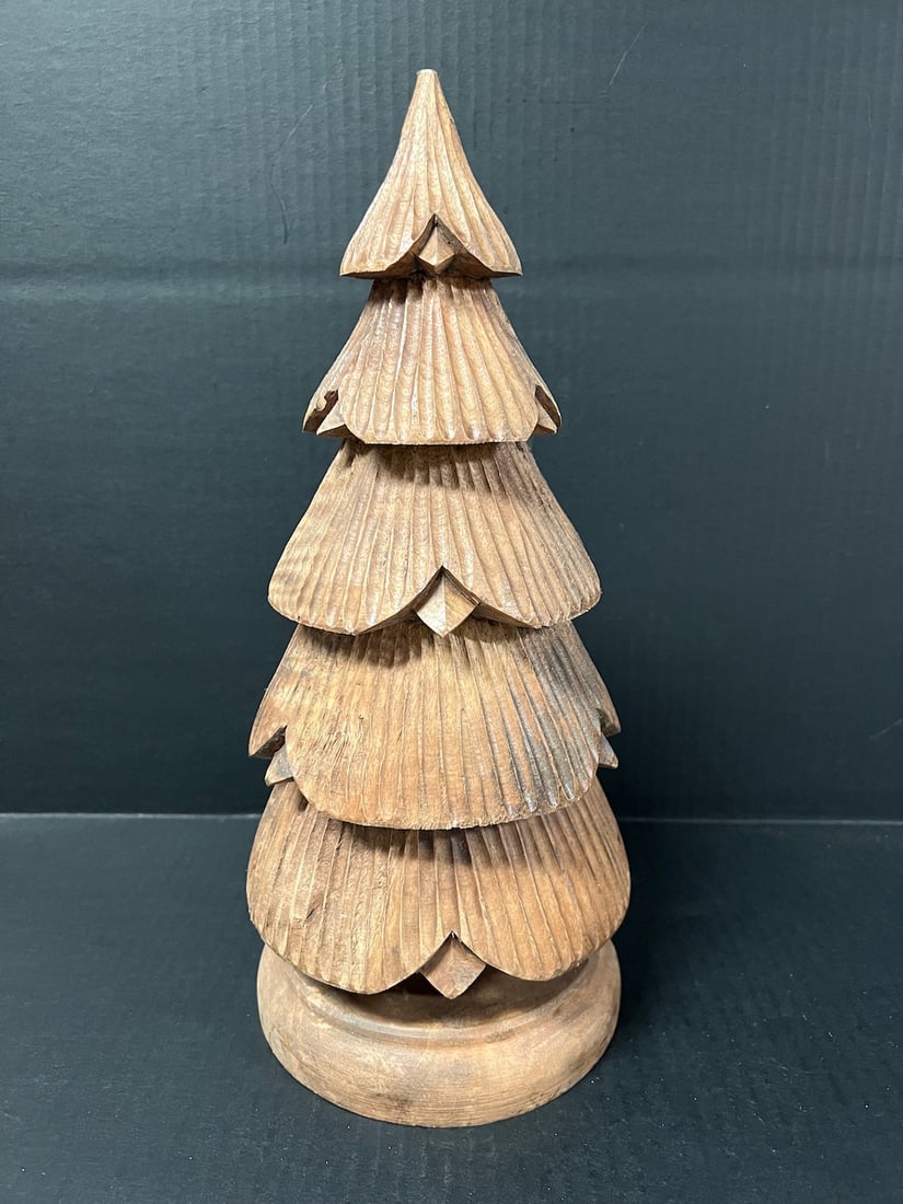 Carved Wood Christmas Tree Sculpture: Carved Wood Christmas Tree Sculpture. The dimension 14.25 inches high x 6 inches wide. The shipping cost for domestic is $40.00 flat rate shipping within the Continental US including handling, packing