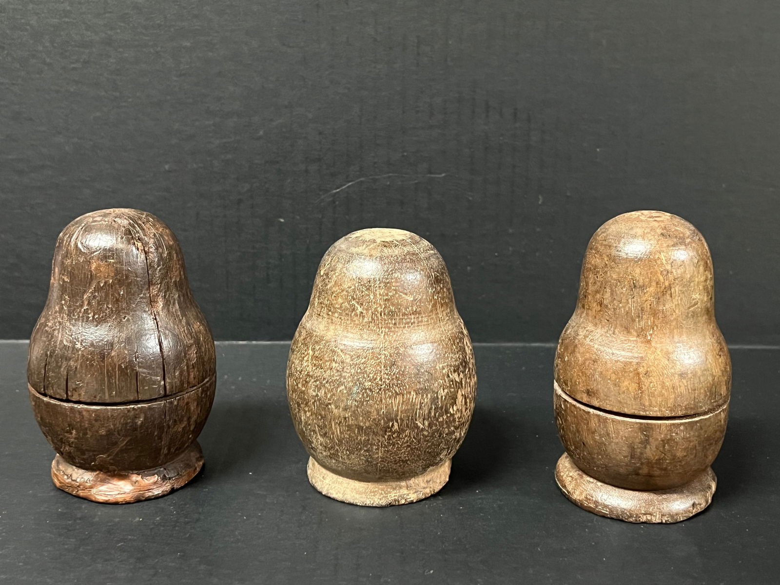 Carved Wood Nesting Doll 3 pieces: Folk Art Carved wood Papermache Mold Nesting Doll. The dimension is estimated 4.75 inches high x 3 inches wide. Please be aware that some of the items are vintage, secondhand, old ages, antiques and m